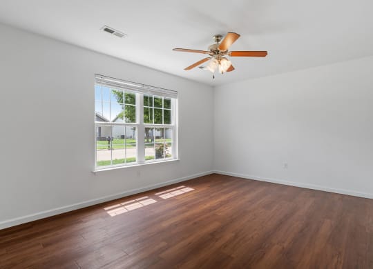 Large Bedroom with Wood-Style Flooring