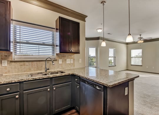 Fully-Equipped Kitchen with Granite Countertops