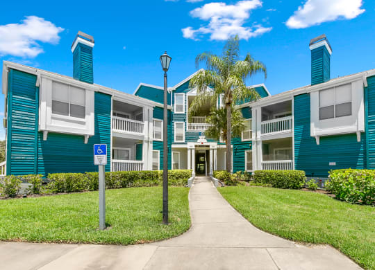 Exterior Entrance To Apartment Homes At Isles Of Gateway