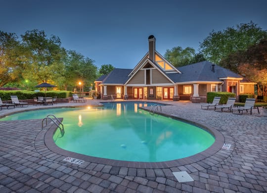 Outdoor Pool & Sundeck At Dusk