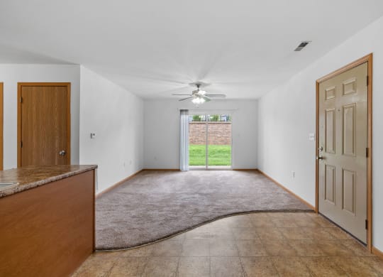 Spacious Living Area with Carpet