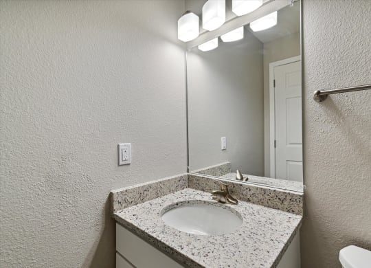 Bathroom With Granite Vanities