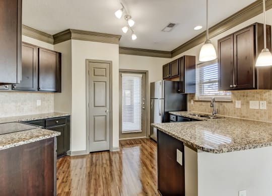 Kitchen with Upscale Wood Finish Flooring