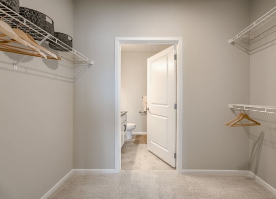 Walk-In Closet With Built-In Shelving