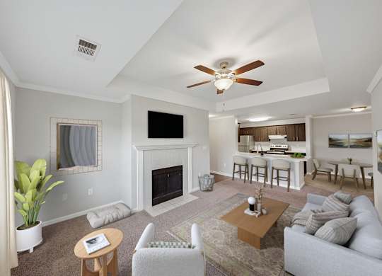 Open concept living area with fire place, dining room area, and kitchen.