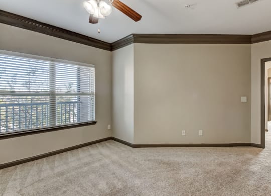 Spacious Bedroom With Ceiling Fan