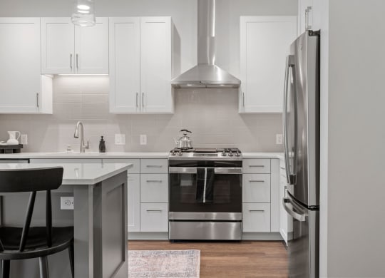 Kitchen Featuring Stainless Steel Appliances With Gas Range