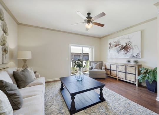 Spacious Living Area with Hardwood-Style Flooring
