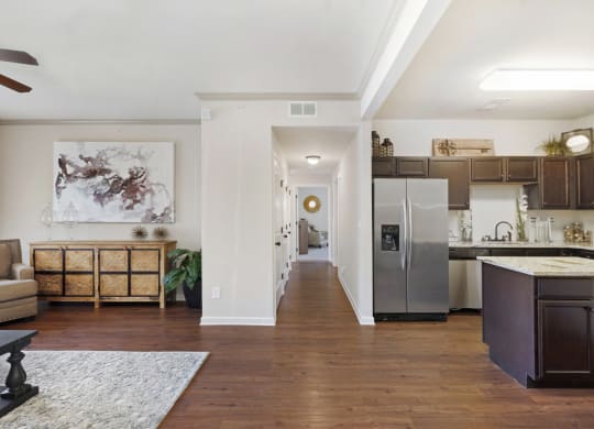 Spacious Living Area with Hardwood-Style Flooring