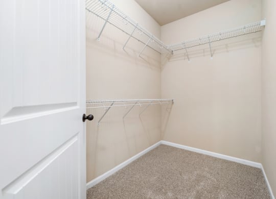 Walk-In Closet With Built-In Shelving
