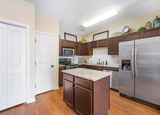 Kitchen with Granite Countertops and Stainless Steel Appliances