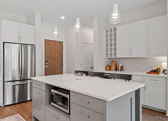 Kitchen Island Featuring Microwave