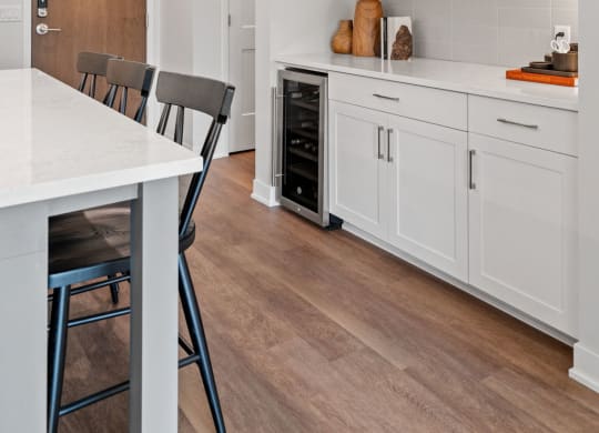 Kitchen Featuring Built-In Buffet & Wine Rack