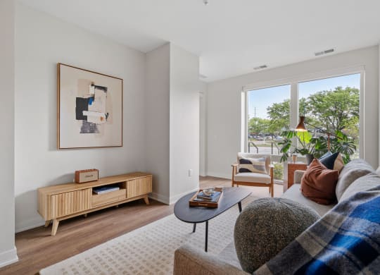 Living Room With Tall Ceilings & Sliding Glass Patio Door