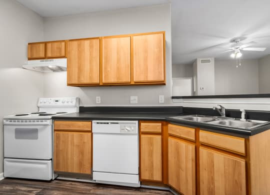 Fully-Equipped Kitchen With White Appliances - Elms Floor Plan