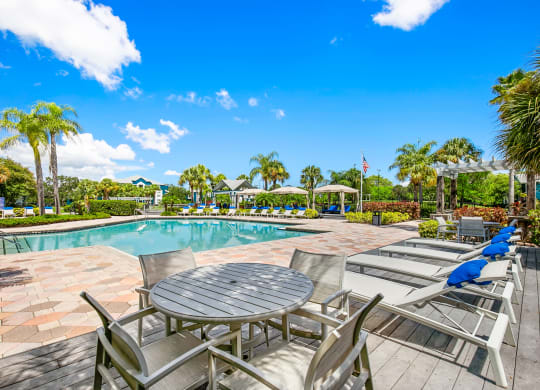Tables & Chairs At The Pool Sundeck
