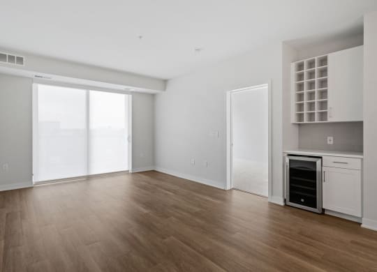 Spacious Living Area With Wood-Style Flooring