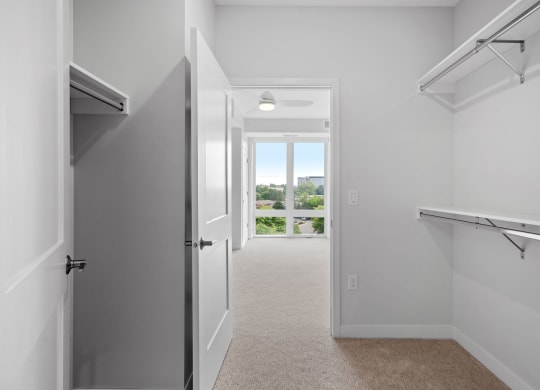 Walk-In Closet With Built-In Shelving