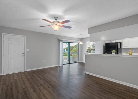 Spacious Living Area with Hardwood-Style Flooring