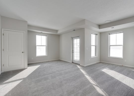 Spacious Living Room With Lots Of Windows