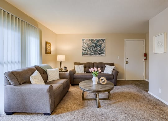 a living room with a couch and a coffee table