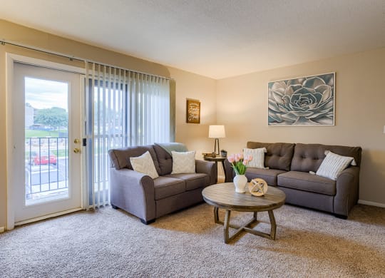 a living room with a couch and a table