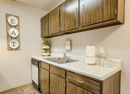 our apartments have a kitchen with a dishwasher and a sink