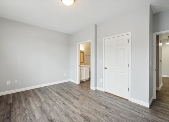 Bedroom with Wood Style Flooring