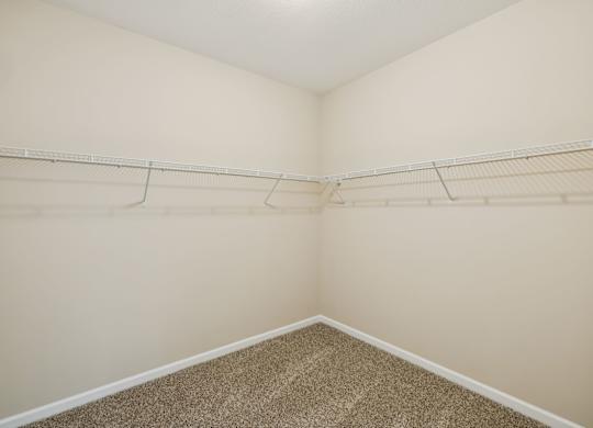 Walk-In Closet With Built-In Shelving