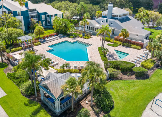 Aerial View Of The Pool, Sundeck & Clubhouse Area