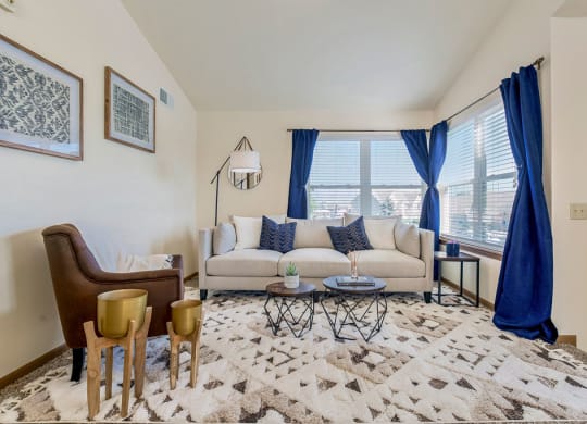 Inviting Living Room Area With Lots Of Windows