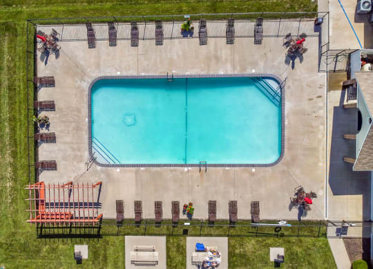 Aerial View Of The Pool & Sundeck With Lounge Chairs