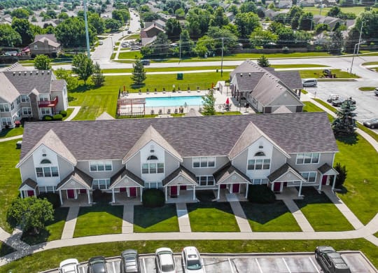 Aerial View Of Apartment Homes Overlooking The Pool & Sundeck