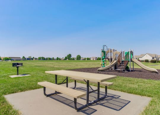 Picnic Table Near The Outdoor Playground Area