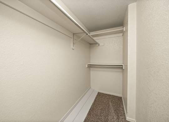 Walk-In Closet With Built-In Shelving