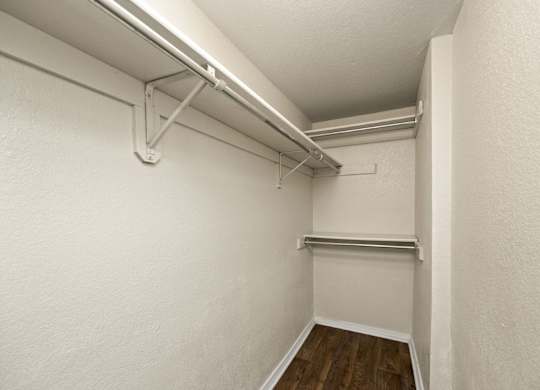 Walk-In Closet With Built-In Shelving