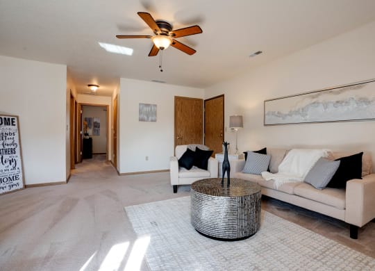 Living Room With Carpeted Hallway