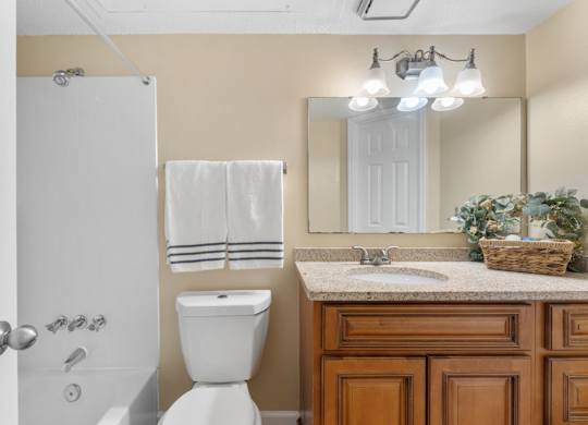 Bathroom with Wood cabinetry