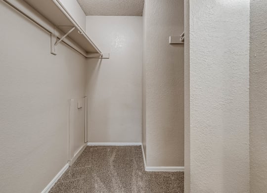 Walk-In Closet With Built-In Shelving