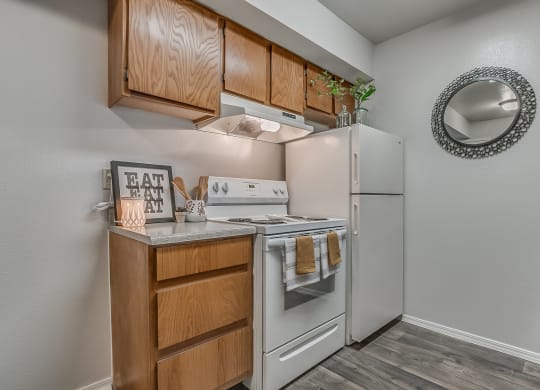 Kitchen Featuring White Appliances