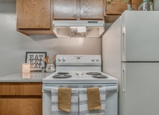 Kitchen Featuring White Appliances