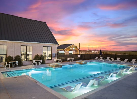 Twilight view of pool