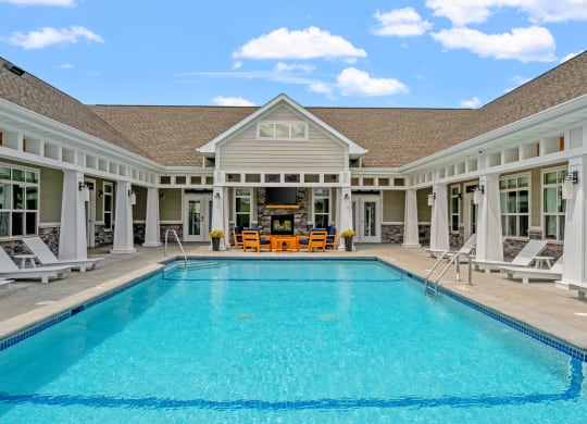 Sparkling Outdoor Pool with Expansive Sundeck