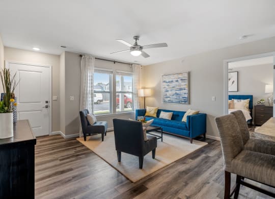 Spacious Living Area With Wood-Style Flooring