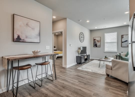 Spacious Living Area With Wood-Style Flooring