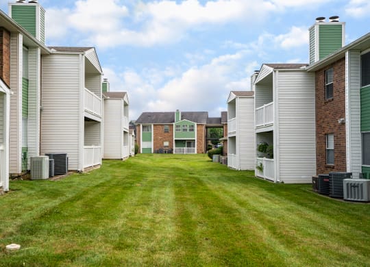Green Grass Area Between Rivergate Meadows Apartment Homes