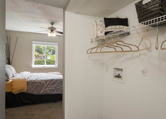 Open Closet With Washer & Dryer Connection