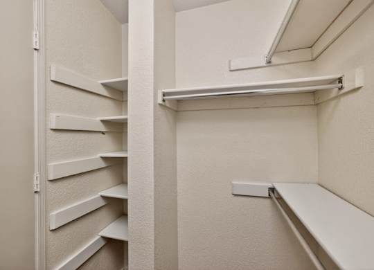 Walk-In Closet With Built-In Shelving
