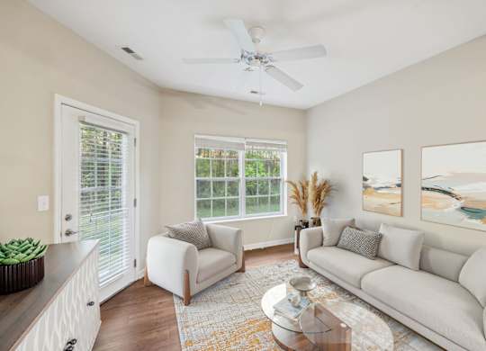 Spacious Living Area With Wood-Style Flooring