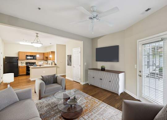 Spacious Living Area With Wood-Style Flooring